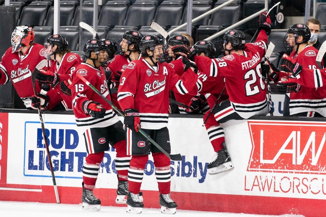 St. Cloud State celebrates a goal against Western Michigan Tuesday, Dec. 1, 2020, at Baxter Arena in Omaha.