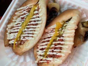 Sonora hot dogs come in pairs at BK Tacos in Tucson. The Mexican restaurant serves tacos, caramelos, hot dogs, soups, salsas and fries for dining or drive-thru.
