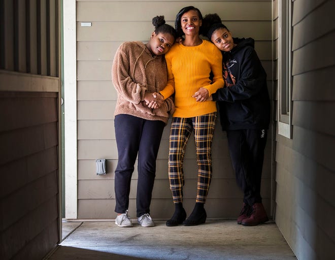 LaChantia Anderson, 39,  and her daughters Aishiah, 14, and Azyria, 16, have had harder times than having to shelter in place during the pandemic. Anderson has been homeless, and lived in a motel and in shelters with her children. She is trying to learn code while taking any job she can.