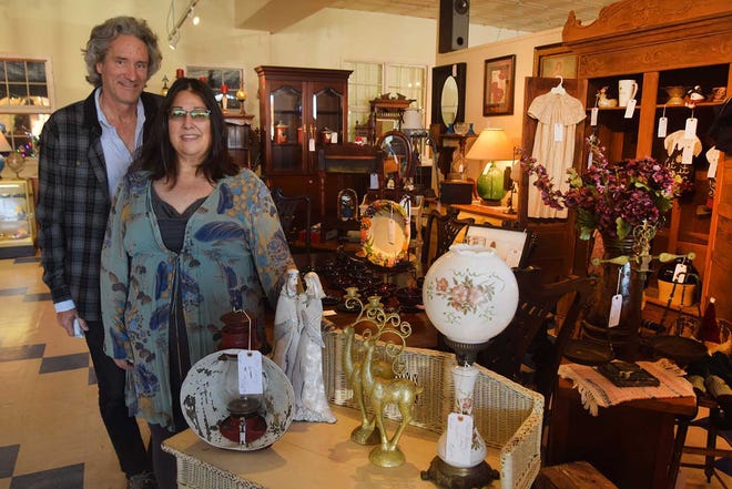 Jeffrey Cheek and Anne Marie Hodrick, owners of Kind of Blue,, have a grand opening Dec 5 along with the Five Points Potters at 919 Broad St.,