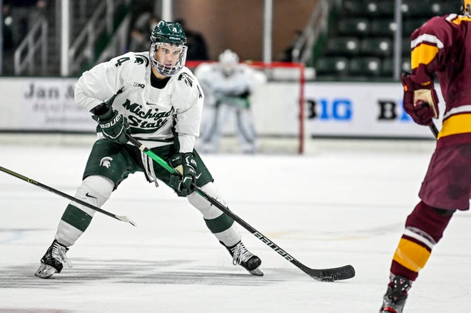 Michigan State's Nash Nienhuis moves with the puck against Minnesota during the second period on Thursday, Dec. 3, 2020, at Munn Ice Arena.