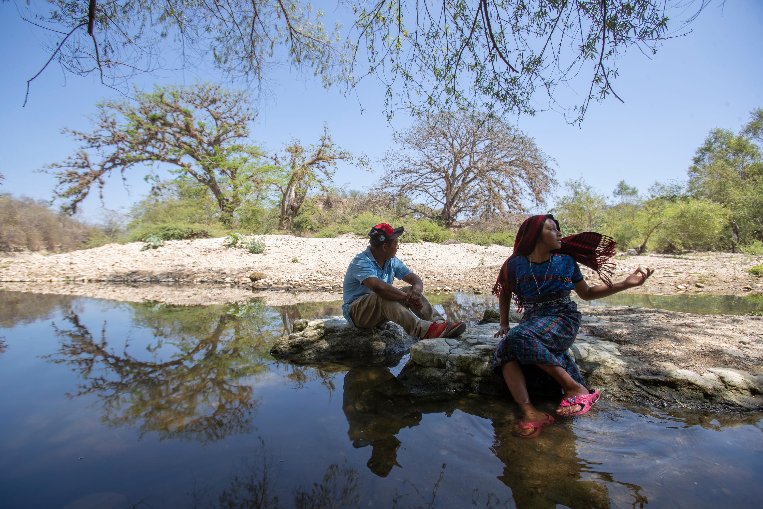 Francisco Sical's Achi community in Guatemala once depended on rain and the Salamá River to farm the land. Reduced rainfall led to pumping of the river, which Sical can't afford. He migrated to the USA in 2019 with his daughter Melissa, 10, but was stopped by the Trump administration's Migrant Protection Protocols.