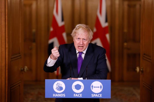 Britain's Prime Minister Boris Johnson speaks during a virtual press conference inside 10 Downing Street in central London on Dec. 2, 2020.