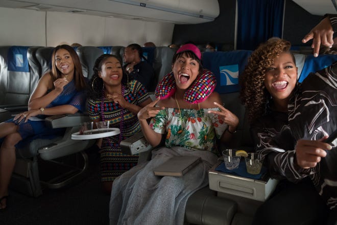Regina Hall (from left), Tiffany Haddish, Jada Pinkett Smith and Queen Latifah play women traveling to New Orleans for wild times in "Girls Trip."