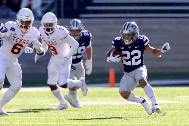Deuce Vaughn, finding running room against Texas in 2020, starred at Cedar Ridge High School before putting his name in the record book at Kansas State.