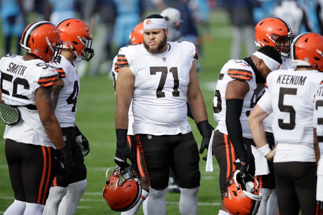 Browns offensive tackle Jedrick Wills (71) warms up before a game against the Titans on Sunday, Dec. 6, 2020, in Nashville, Tenn. (AP Photo/Ben Margot)