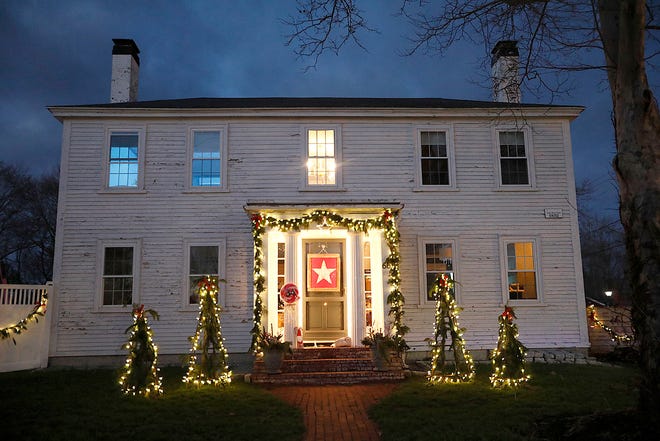 A home on Main Street decorated for the Norwell Woman's Club drive-by house tour. The club also set up a special drive-by meet-and-greet for kids with Santa on the town common on Sunday, Dec. 6, 2020.