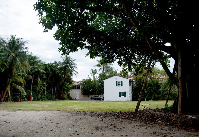 A mostly vacant lot of about a half-acre at 220 Jungle Road in Palm Beah's Estate Section has sold for $6.95 million. The garage structure at the rear remained after a 1935 house was razed following the sale of the property in 2017.