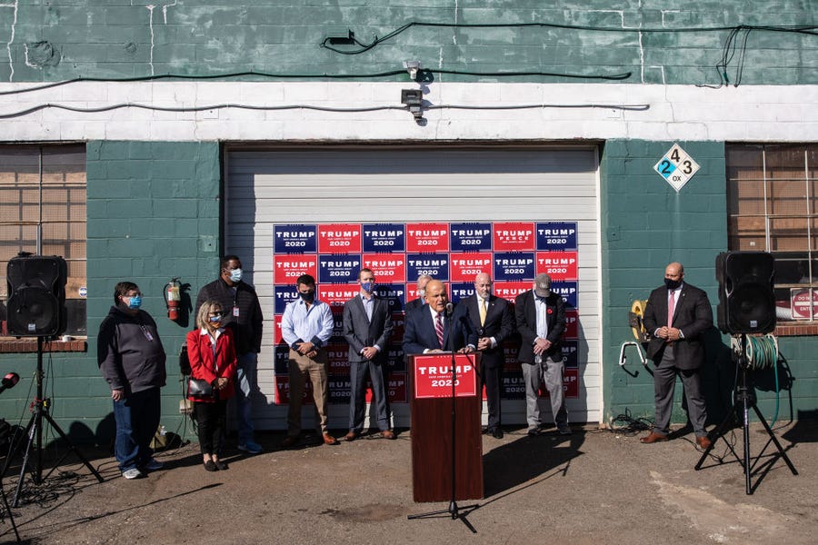 Attorney for the President, Rudy Giuliani speaks to the media at a press conference held in the back parking lot of Four Seasons Total Landscaping on November 7, 2020 in Philadelphia, Pennsylvania. The press conference took place just minutes after news networks announced that Joe Biden had won the presidency over Donald Trump after it was projected that he had won the state of Pennsylvania.