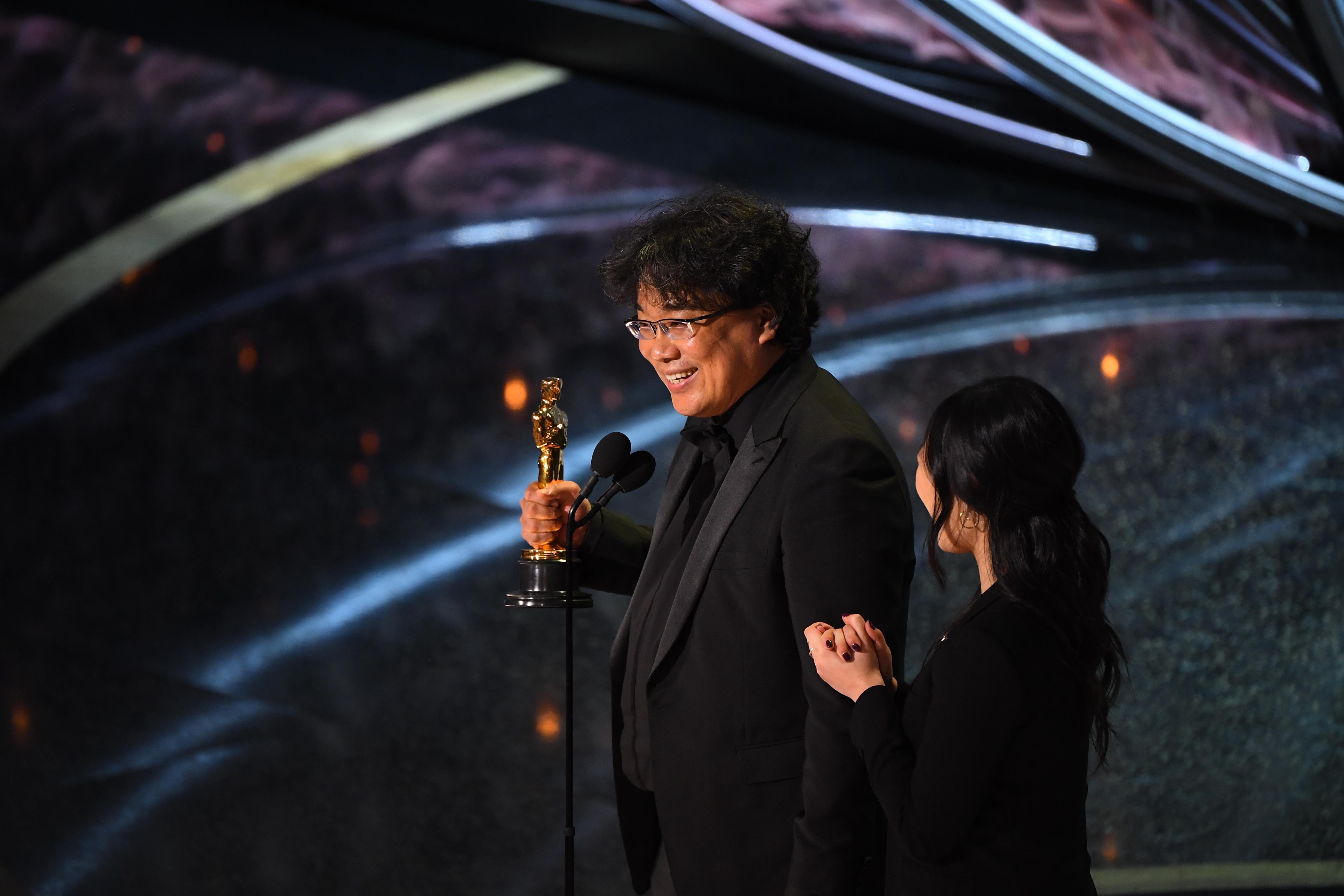 Bong Joon-ho accepts the award for best international feature film of the year for "Parasite" from South Korea during the 92nd Academy Awards at Dolby Theatre on Sunday, February 9, 2020. "Parasite" also won for best picture, best director and best original screenplay.
