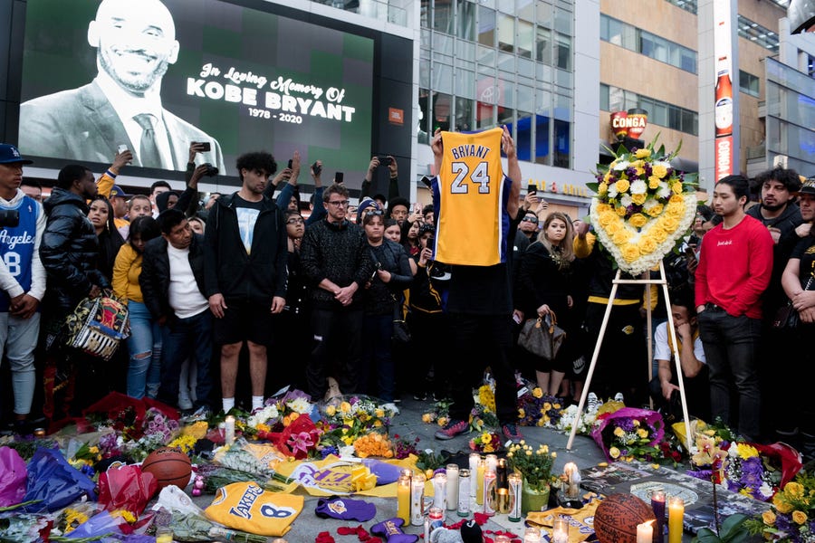 Fans gather at L.A. Live to pay their respects to former Los Angeles Lakers guard Kobe Bryant and his daughter Gianna, who died along with seven other people in a helicopter crash on January 26, 2020.