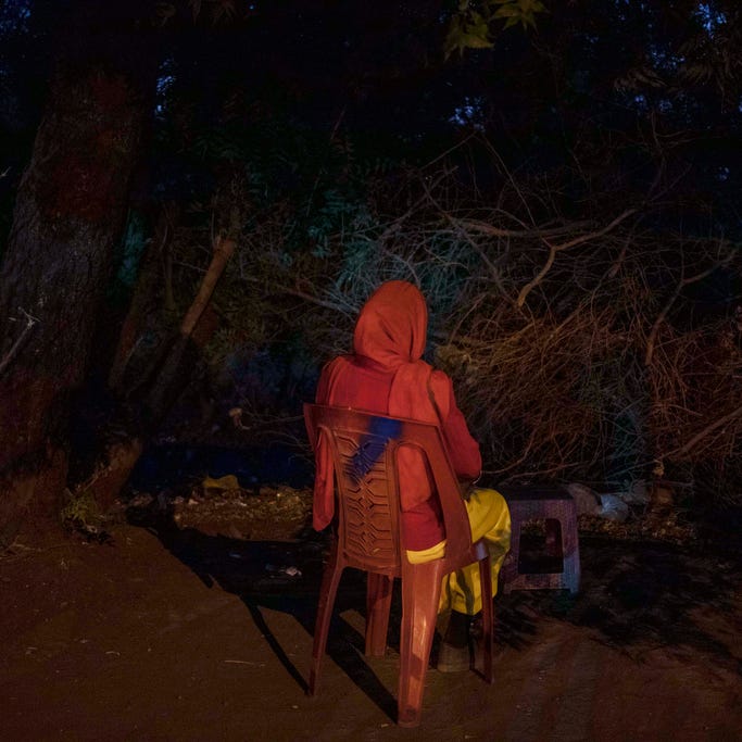 This January 12, 2020, photo shows Mayada, a 22-year-old tea vendor who is seven months pregnant with twins, the result of a gang-rape by Sudanese security forces, in Khartoum, Sudan. Dozens of women were raped on June 3, 2019, as security forces attacked a sit-in protest camp in Khartoum, according to activists' counts. Mayada wanted to end the pregnancy, but a pharmacist refused to sell her pills to cause an abortion. She hurt herself, lifting heavy objects and throwing herself off furniture, hoping for a miscarriage. She would give birth in March to a daughter, while the other twin, a boy, died. She doesn't know the names of the men who raped her, much less which is the father.