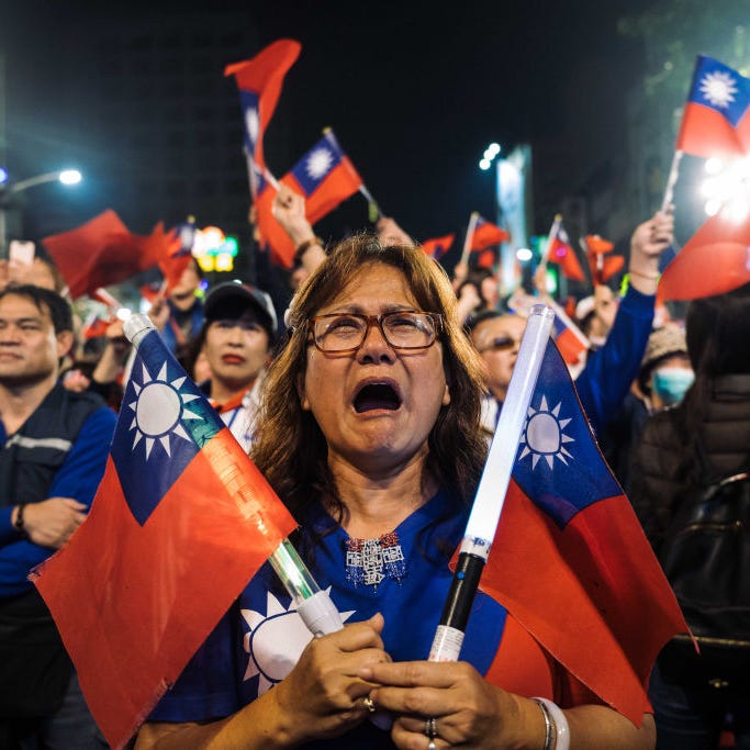 Supporters of Han Kuo-Yu, presidential candidate for Taiwan's main opposition Kuomintang (KMT) party, rally outside the campaign headquarters on January 11, 2020 in Kaohsiung, Taiwan. Tsai Ing-wen, the country's first female president, would go on to win reelection.