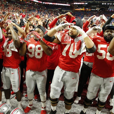 Ohio State players celebrate after the Buckeyes de