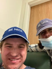 Travis Luxenberg, 33, and his mother, Linda take a selfie at Dartmouth Hitchcock Medical Center, where Travis was sent after he experienced a crisis in the summer of 2020.