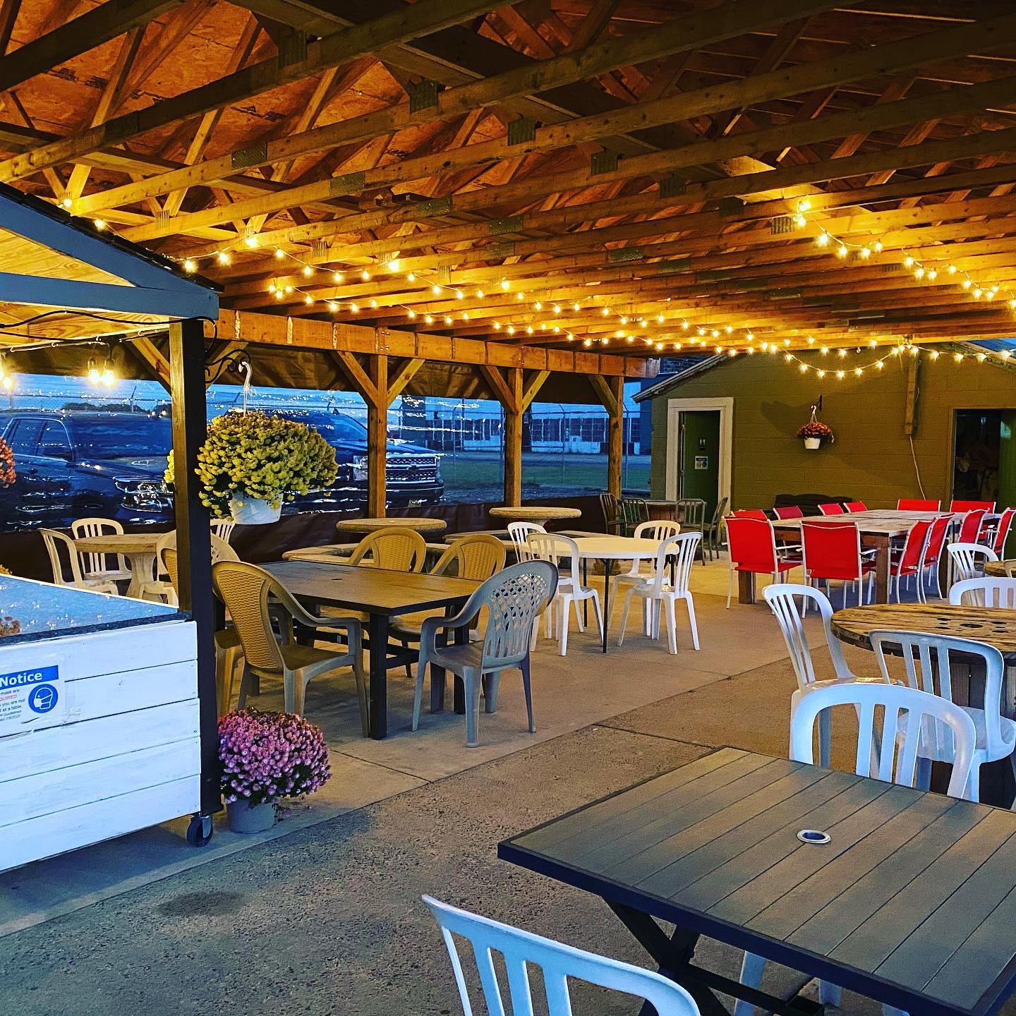 The cozy outdoor setting at Verna's Flight Line Restaurant in Millville.