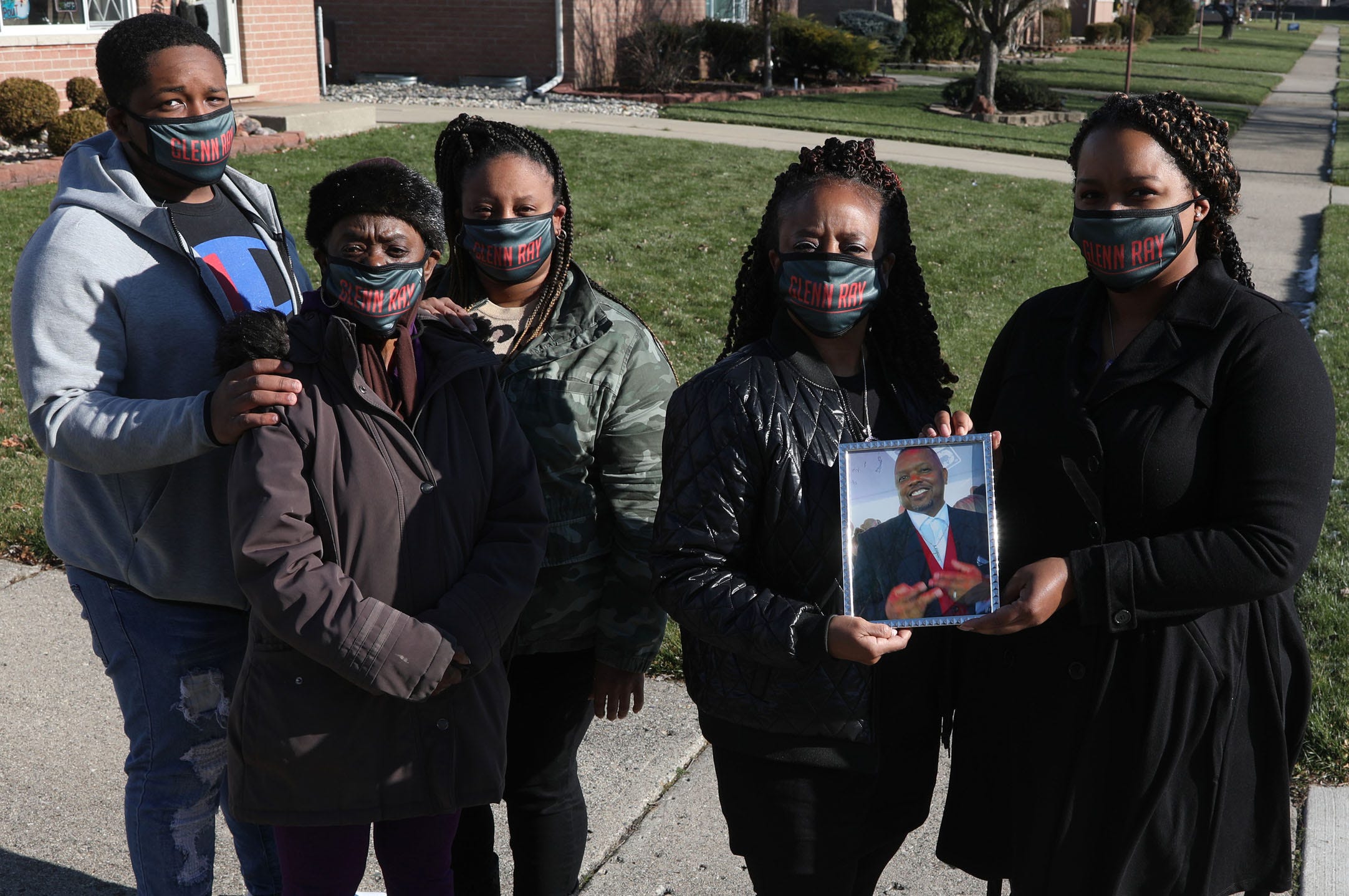 Glenn Ray McColor Jr., 53, of Roseville died March 24, 2020, after being diagnosed with COVID-19.  
McColor’s family wore masks with his name on Dec. 3, 2020. (L to R) DaQuan McDonald, his step grandson; Dorothy McColor, his mother; LaRawnda Davis, his stepdaughter; Brenda McColor, his wife and Candice McColor, his daughter.
McColor lived an active life and traveled, worked, went to the gym, restaurants and church in the days leading up to his illness, his family said. McColor was admitted to the hospital on March 10, the same night Gov. Gretchen Whitmer announced Michigan’s first coronavirus cases.