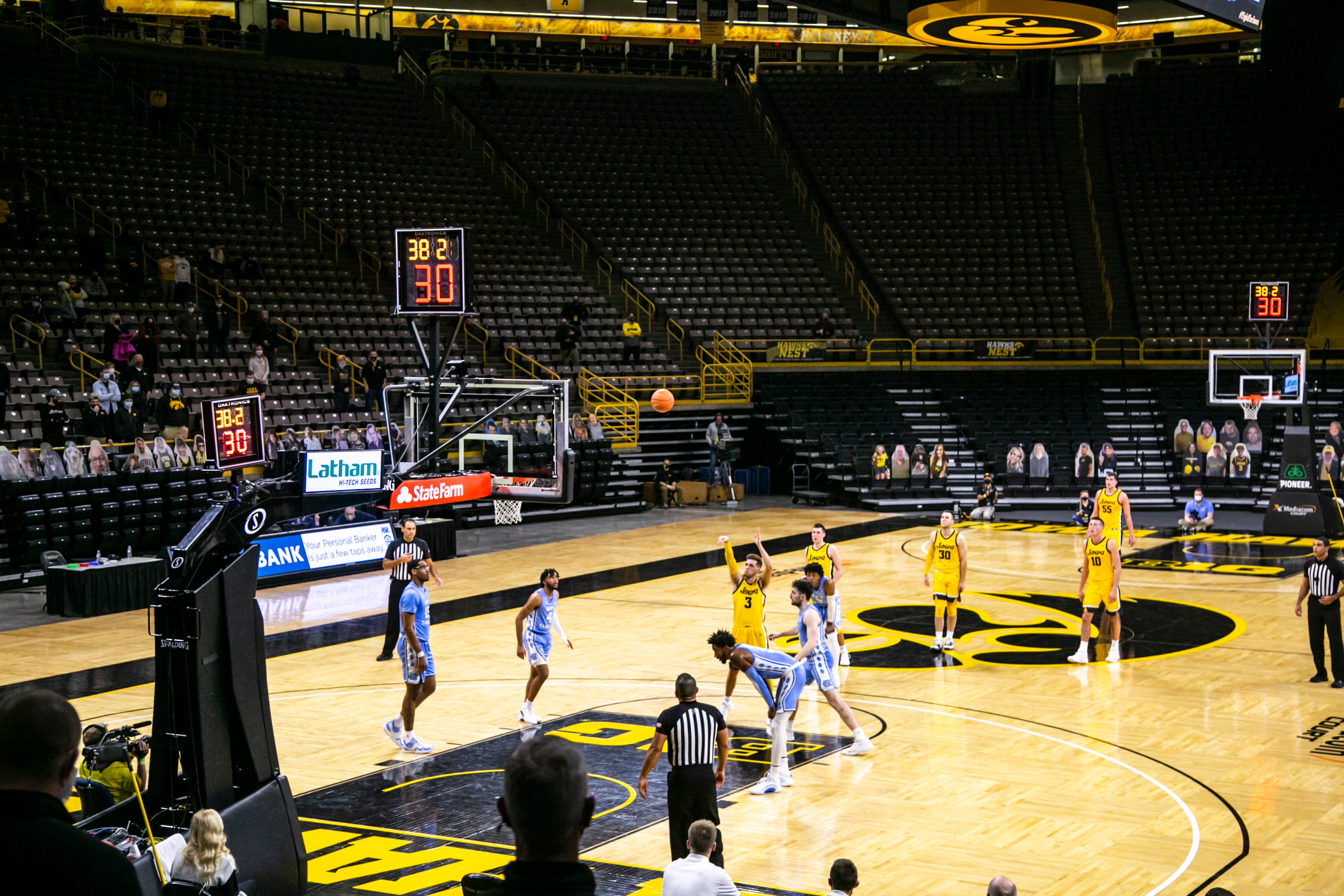 8:34 p.m. IOWA CITY - Iowa guard Jordan Bohannon (3) shoots a free throw during a NCAA non-conference men's basketball game in the ACC/Big Ten Challenge, Tuesday, Dec. 8, 2020, at Carver-Hawkeye Arena in Iowa City, Iowa. The Big Ten Conference has limited the number of fans allowed to attend games this season amid the novel coronavirus pandemic to families of players.