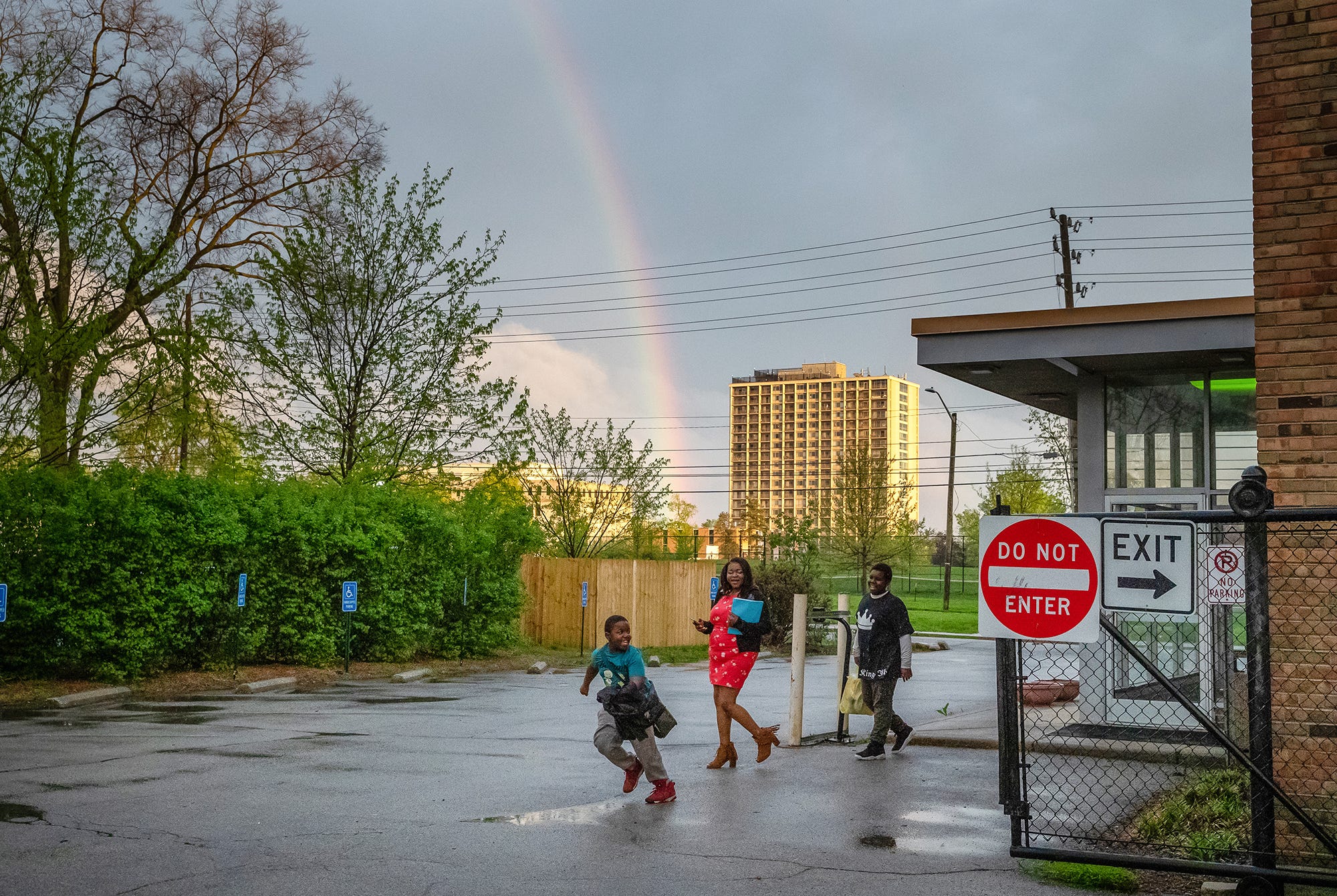 Takkara Delaney, a single mother of five, leaves the Martin Luther King Community Center, alongside her sons, Tyree, 12, and Tyson, 8, after a Kingish session. "Kingish is our non-profit organization that we started just based on being in the neighborhood and realizing there was a lot of trauma was going on with the kids," she said. "The boys are involved and they actually helped me come up with this idea. They're not too young to make a difference." Before the COVID-19 pandemic, Delaney lead the small group of teens from the neighborhood to speak openly about issues they face. Topics included race, gun violence, and abuse – issues that they can forget about on the football field.