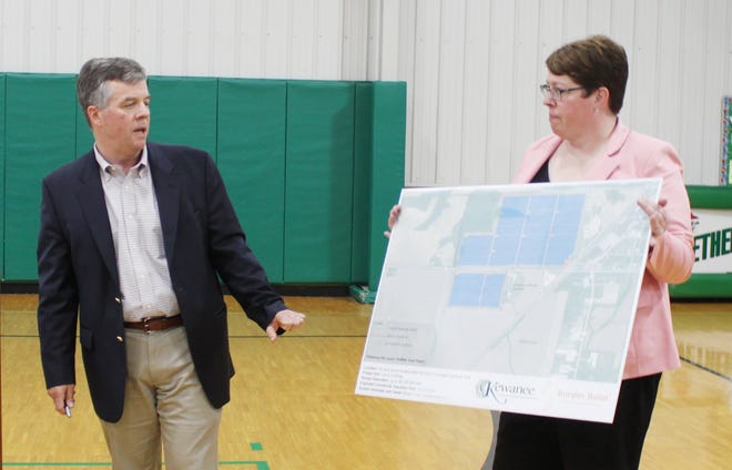 Sunpin officials present details of a 24.75 megawatt solar farm to local  business leader at a 2019 informational meeting held at Wethersfield High School