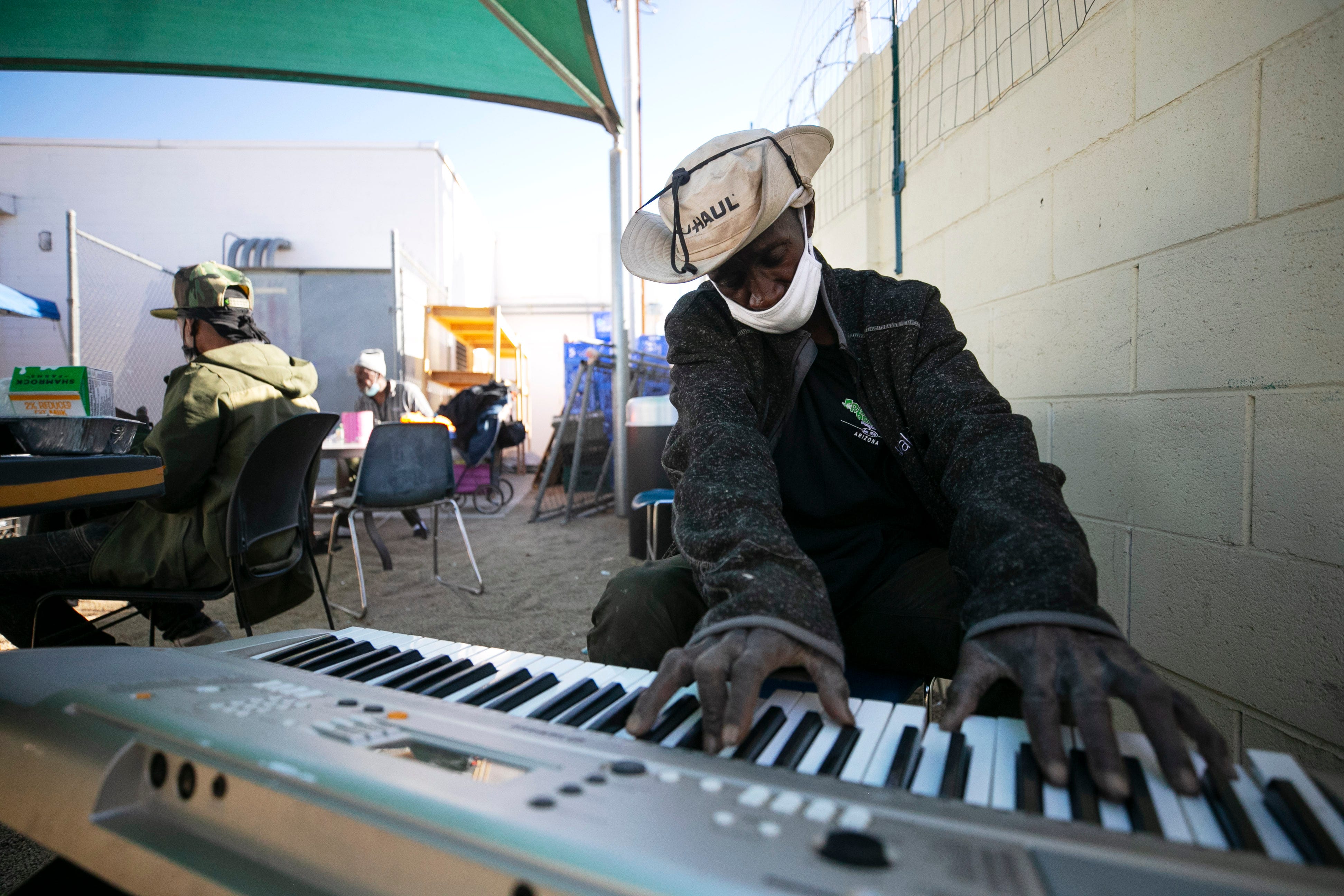 "This is not a good place to be homeless," says William Webb, 62, about the Phoenix area's extreme temperatures. "If I go stand in that sun, it's no good."