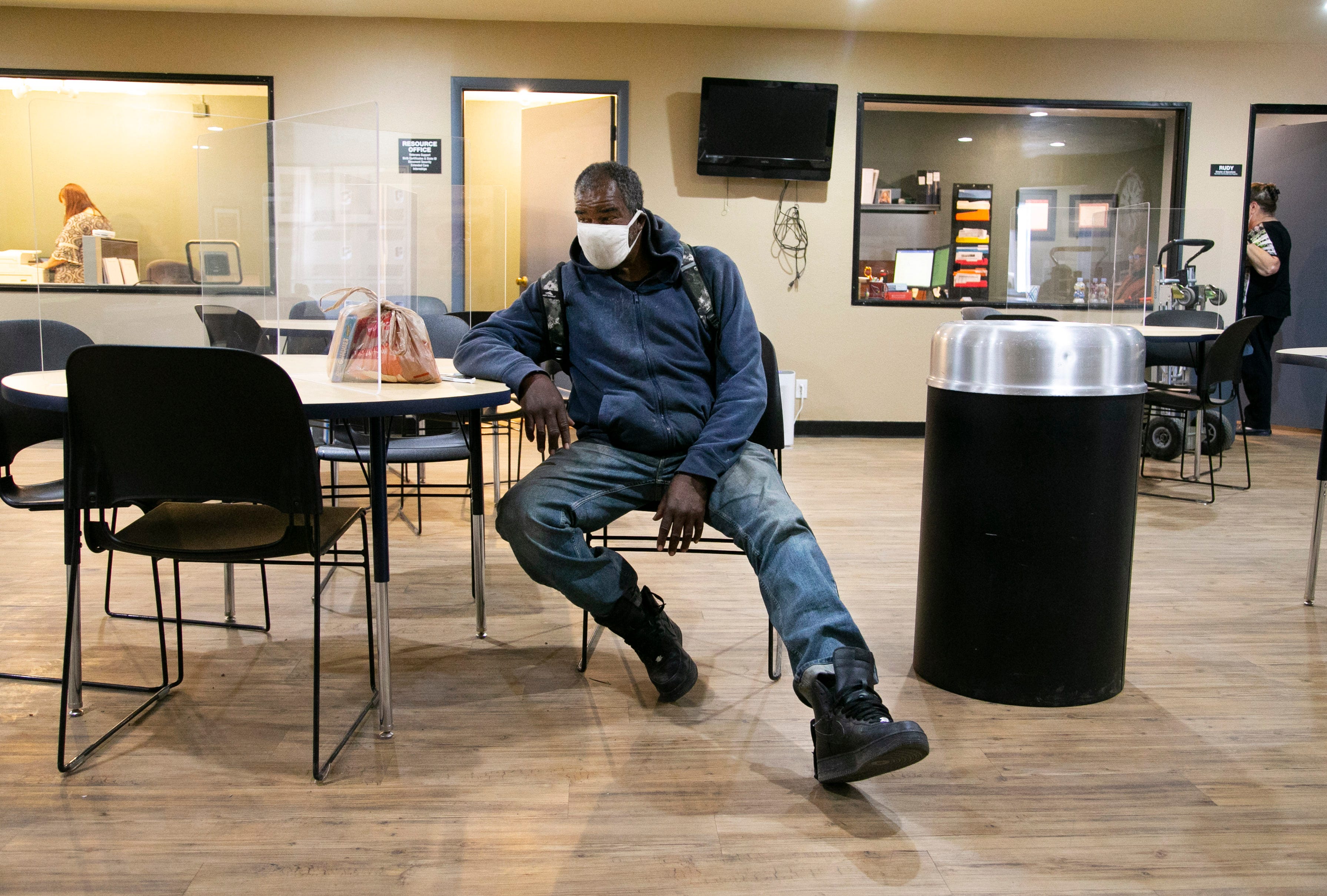 Kyle Holloway, 57, rests at the Justa Center in Phoenix on Dec. 9, 2020.