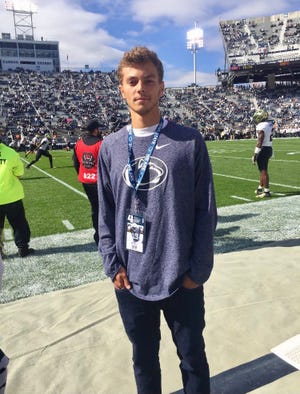Dallastown senior Mitchell Groh poses for a photo on the sideline at Beaver Stadium during his visit to Penn State in 2019. Groh announced his verbal commitment to the Nittany Lions on Wednesday.
