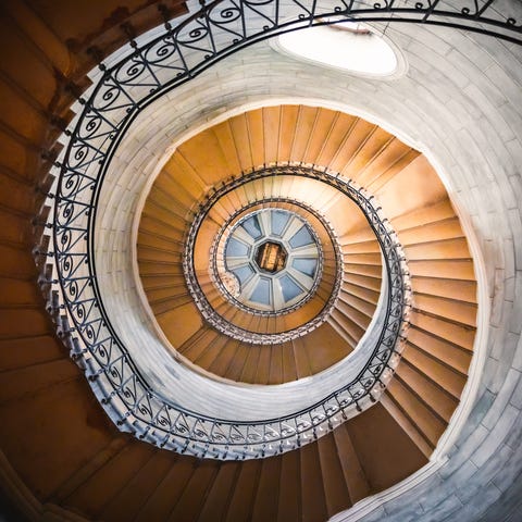 Architecture of a large spiral staircase with beau