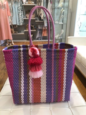 Abby's on the Island also offers handwoven bags, like this one made in Mexico by Squeeze de Citron. It retails for $175.