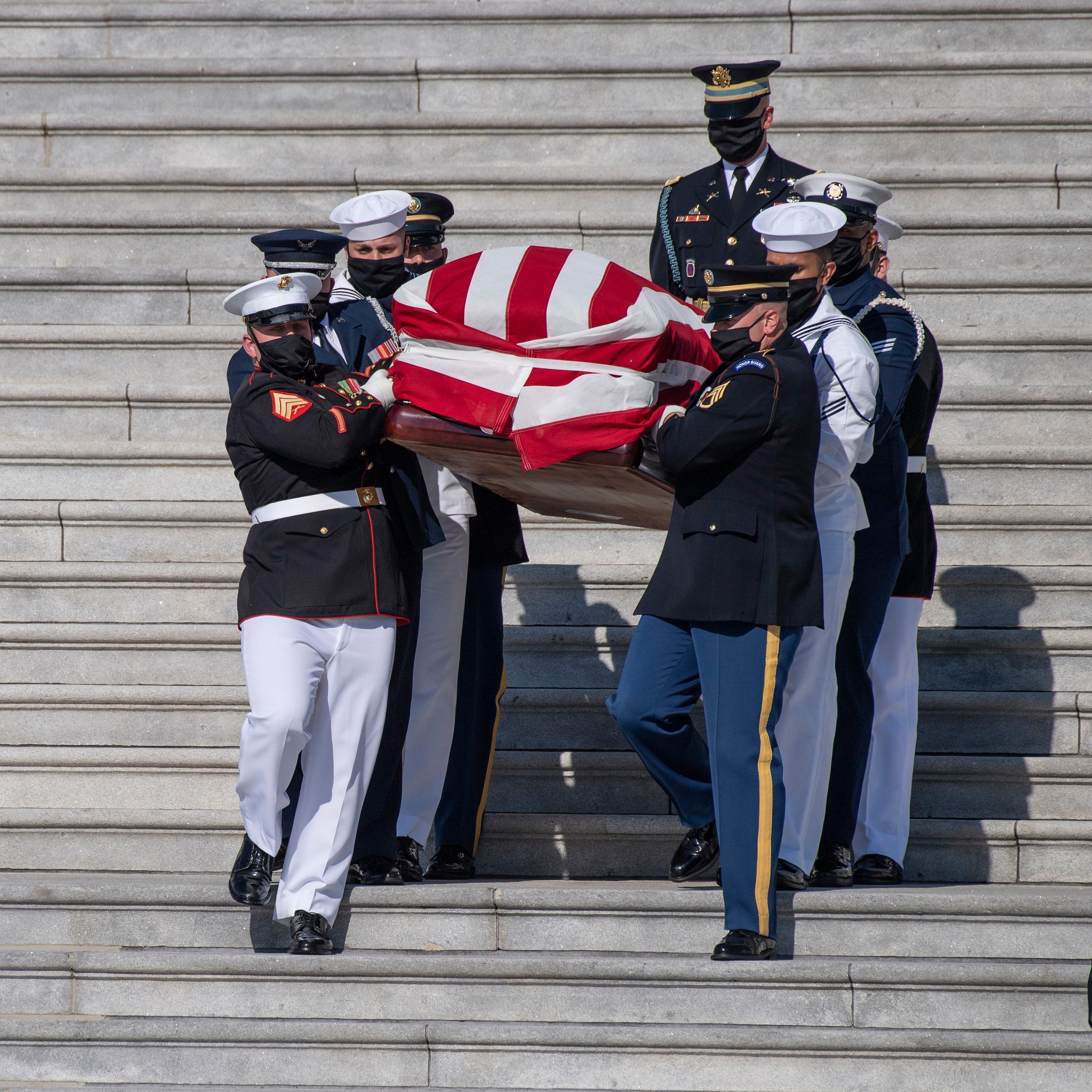 Rep. John Lewis is carried by joint military honor guard from the U.S. Capitol on July 29, 2020 in Washington. 