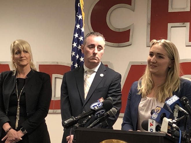 Buckingham's Madison Zezzo, right, with her mother, Erin, and Rep. Brian Fitzpatrick, R-1, Middletown, discuss proposed federal legislation to increase penalties for stalking and cyberstalking of minors.