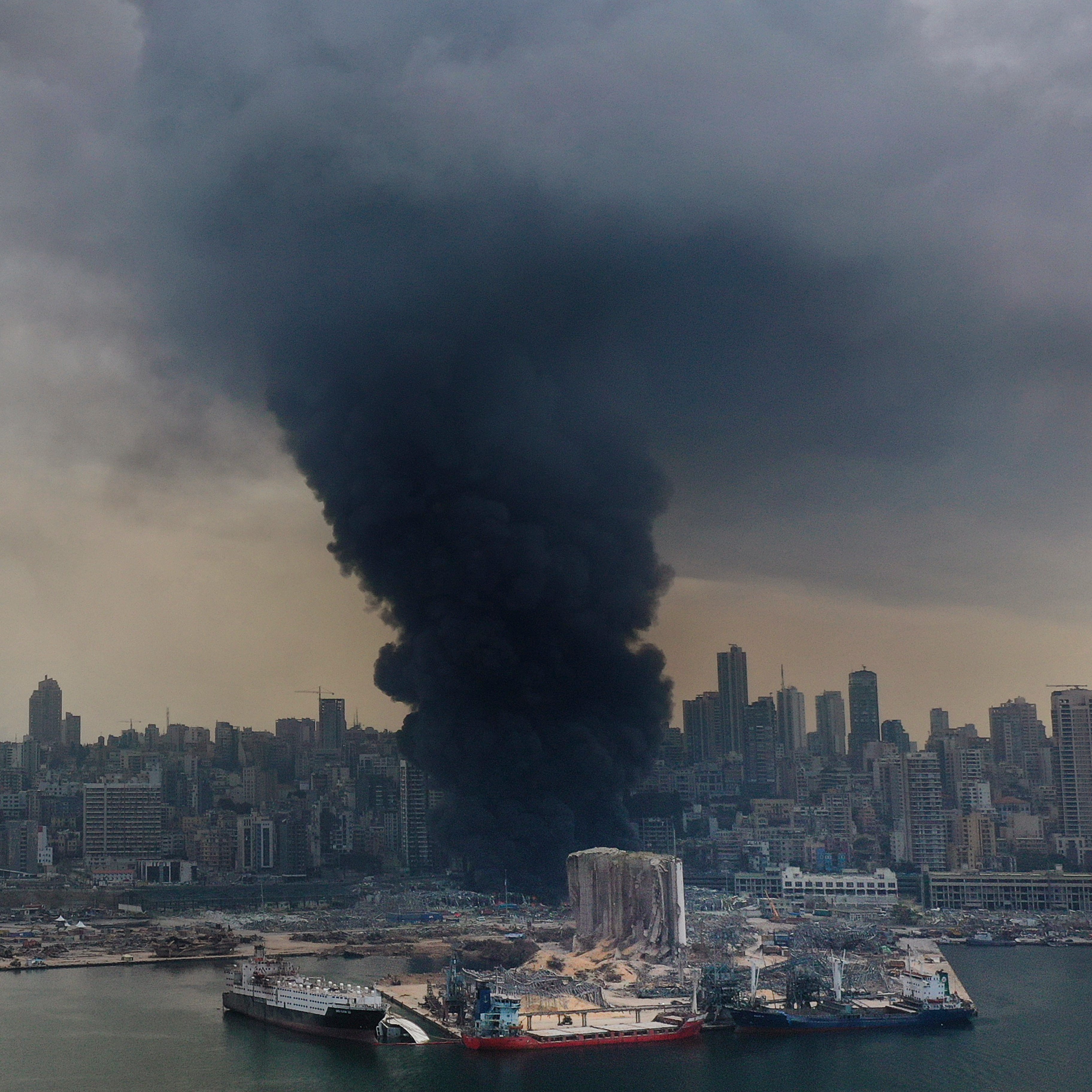 Black smoke rises from a warehouse fire at the Port of Beirut, Lebanon, on Sept. 10. 2020, triggering panic among residents traumatized by the massive explosion that killed and injured thousands of people the month before. 