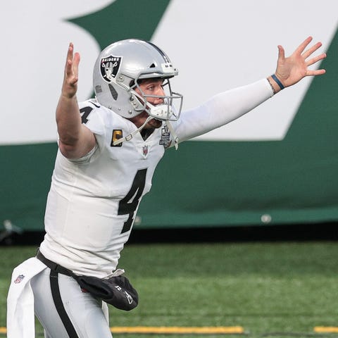 Raiders quarterback Derek Carr celebrates his winn