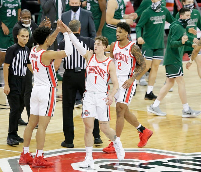 Ohio State Buckeyes guard Jimmy Sotos (1) is congratulated by Ohio State Buckeyes guard Musa Jallow (2) after scoring during the second half of Sunday's NCAA Division I basketball game against the Cleveland State Vikings at Value City Arena in Columbus, Oh. on December 13, 2020. Ohio State won the game 67-61.