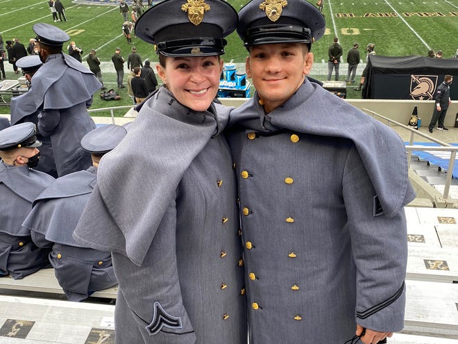 Lane and Sage Peters, son and daughter of Chett and Bethanie Peters of Uhrichsville, pose for a photo during the annual Army-Navy football game held at West Point on Saturday. The Black Knights hosted the midshipmen of the Naval Academy for the first time on the post at West Point since 1943. The Black Knights had been 0-3 versus the midshipmen at home. But this year they broke history and beat the midshipmen 15-0 in a fog filled battle on the Hudson. Lane is a senior two-year captain of the wrestling team and will graduate in May. Sage is a sophomore majoring in Kinesiology and a member of the Black Knights softball team.