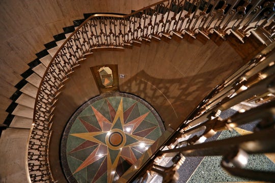 Art Deco motifs are seen in a circular stairwell at the Bottleworks Hotel, Monday, Dec. 14, 2020. This is looking down from the second floor towards the first floor. The 139-room boutique hotel, occupying the top two floors in the historic former Coca-Cola bottling plant's administration building, opens on Tuesday, Dec. 15, 2020.