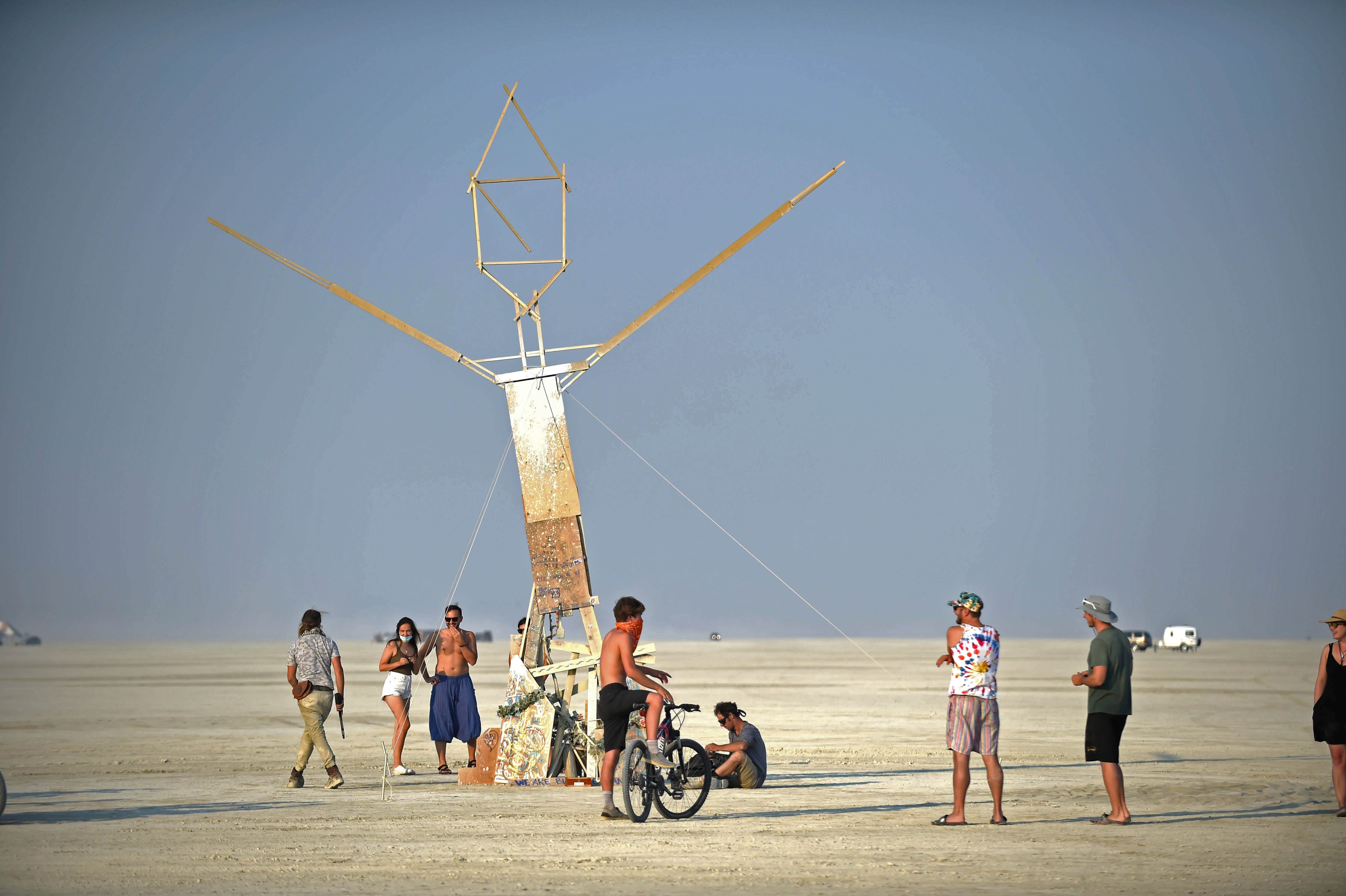 People gather on the Black Rock Desert Sept 5, 2020. Burning Man 2020 was cancelled because of the pandemic, but people still went out to the playa and had their own burn.