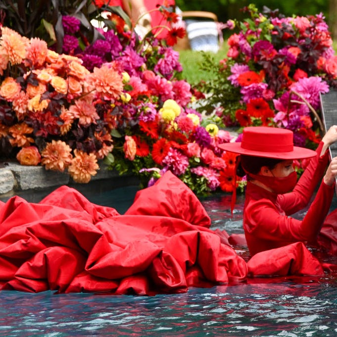 Coco Rocha swims in the pool at the runway for the Christian Siriano Collection 37 2020 Fashion Show on September 17, 2020 in Westport, Connecticut.