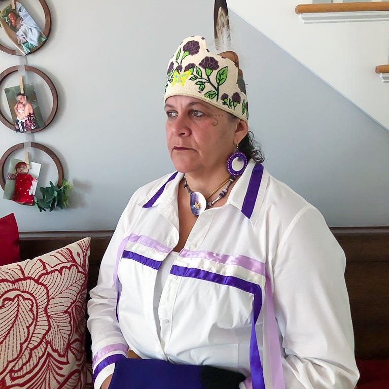 Jessie Little Doe Baird poses in her Wampanoag regalia in her home in Mashpee, Massachusetts on July 17, 2020. Baird is a linguist best known for her work to revive and teach the Wampanoag language through the The Wôpanâak Language Reclamation Project. This portrait was part of USA TODAY's Women of the Century project.