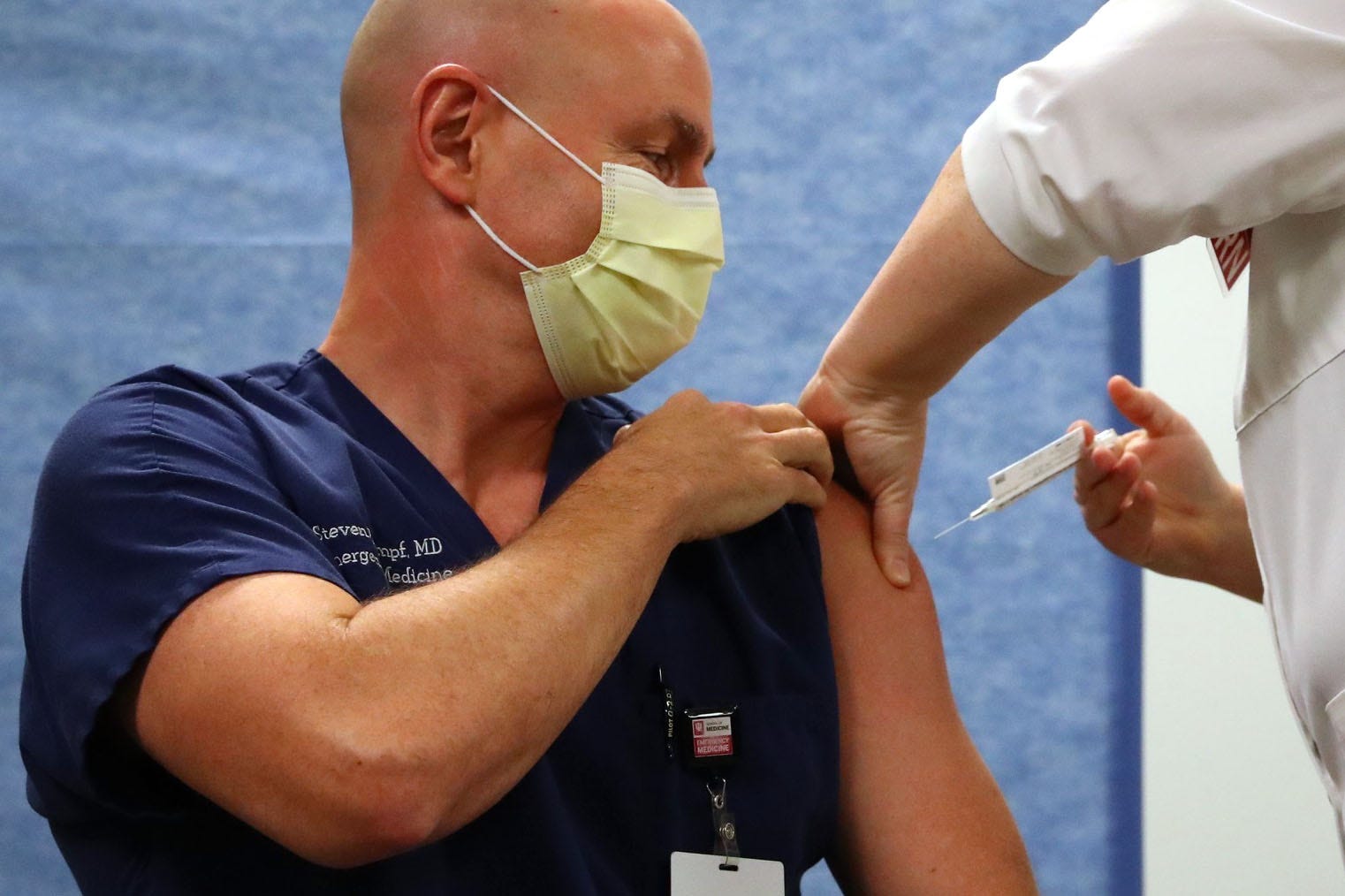 Dr. Steven Roumpf received the COVID-19 vaccine at IU Health Methodist's Neuroscience Center in Indianapolis, Wednesday, Dec. 16, 2020. He was among the first frontline medical workers to receive the vaccine in Indianapolis.