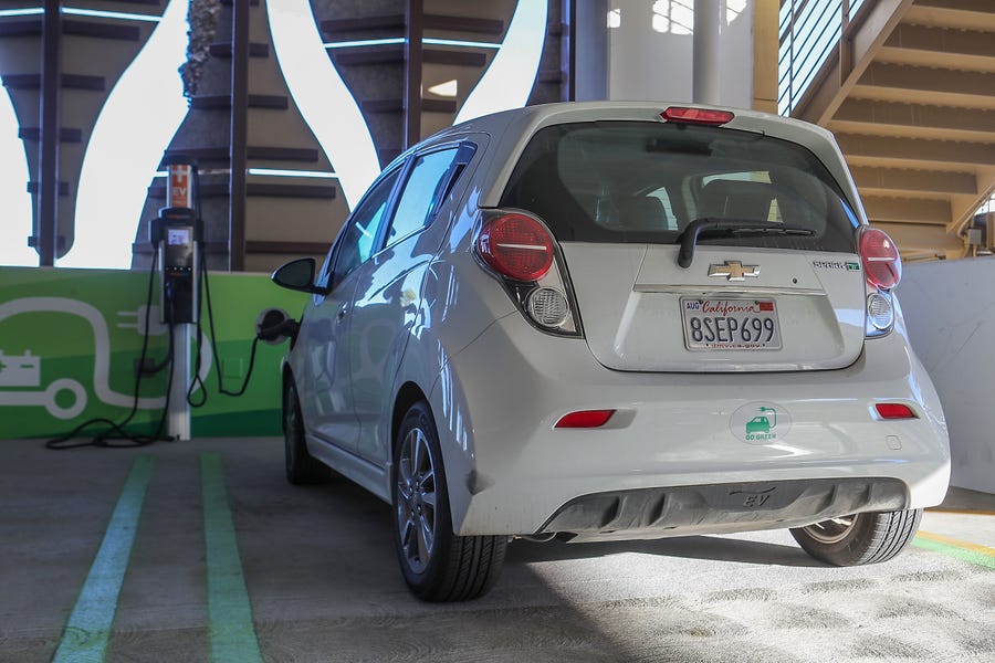 A vehicle charges at a charging station in the parking garage of the Agua Caliente Casino in Palm Springs, Ca., December 15, 2020. 