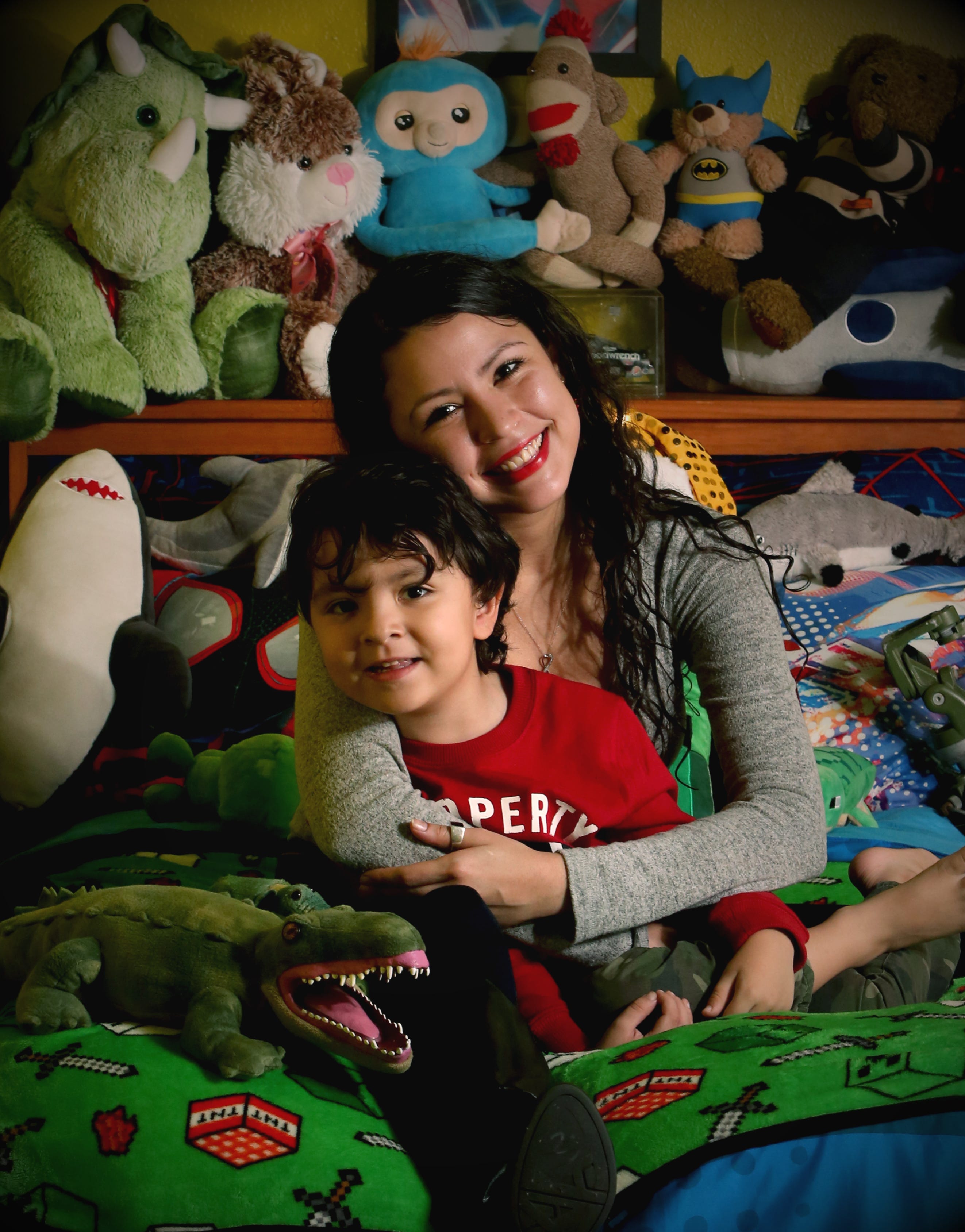 Ashley Burbach, 26, and her 4-year-old son, Cash, shown at their Ormond Beach home, were reunified in November.