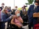 Florida Gov. Ron DeSantis watches as nurse Christine Philips, left, administers the Pfizer-BioNTech vaccine for COVID-19 to Vera Leip, 88, a resident of John Knox Village, Wednesday, Dec. 16, 2020, in Pompano Beach, Fla. Nursing home residents and health care workers in Florida began receiving the vaccine this week.