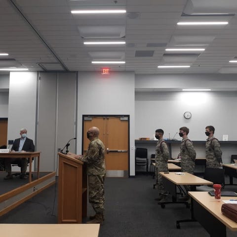 Master Sergeant Raymond Gonzales and JROTC cadets,