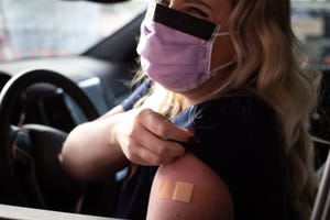HonorHealth clinical nurse educator Jenae McVicker gets vaccinated on Dec. 17, 2020, at HonorHealth in Phoenix.
