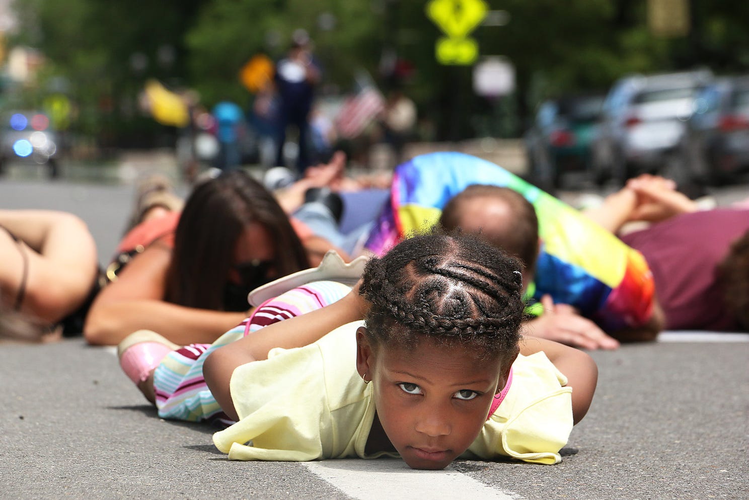 6 year old Destinie (last name withheld by mother) lies on the ground with her fellow protesters for almost 9 minutes during a Black Lives Matter rally in Carson City on June 20, 2020.