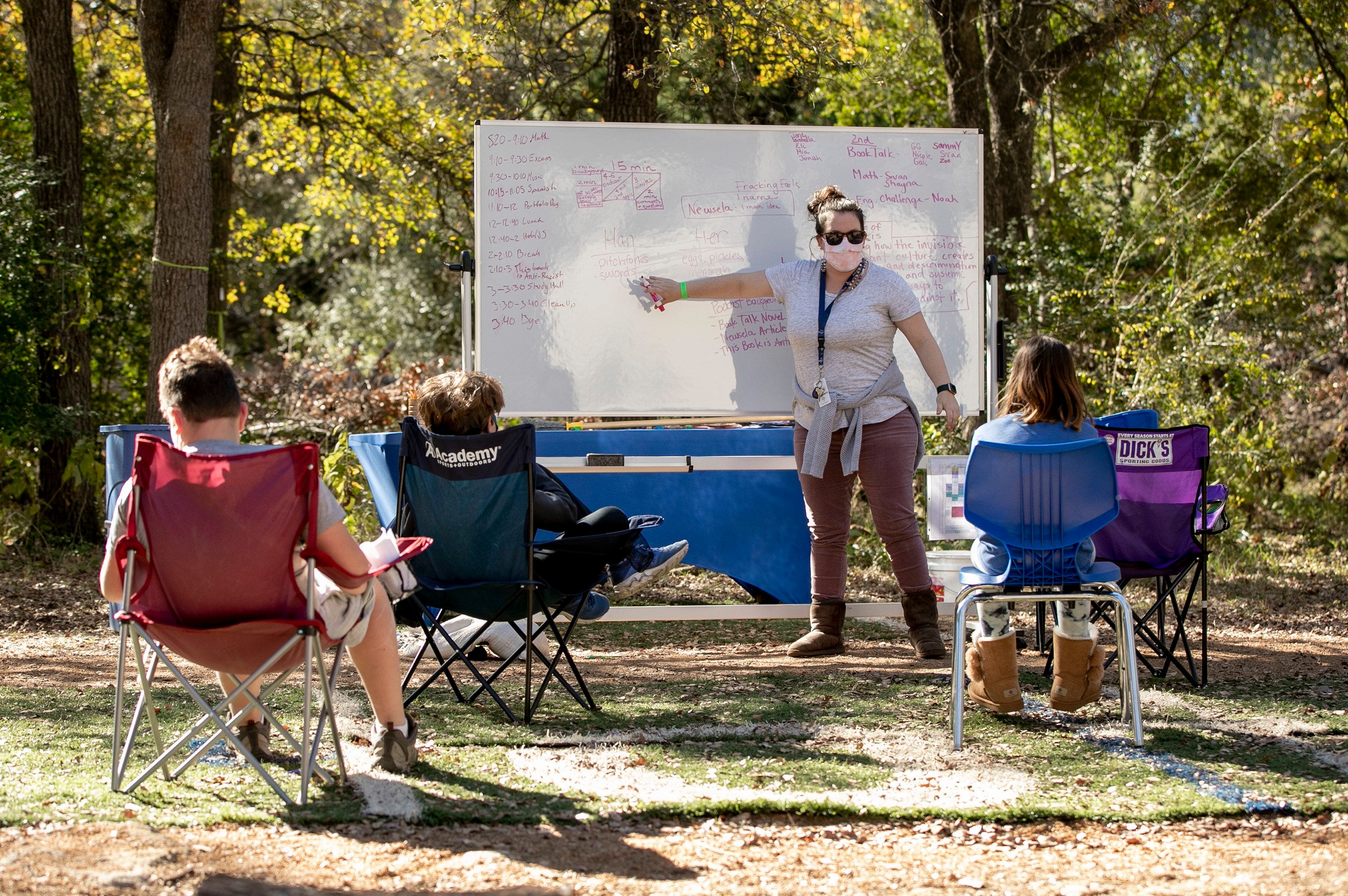 Jewish Studies teacher Heather Kantrowitz teaches fifth-graders at an outdoor class at the Austin Jewish Academy on Tuesday December 8, 2020. 