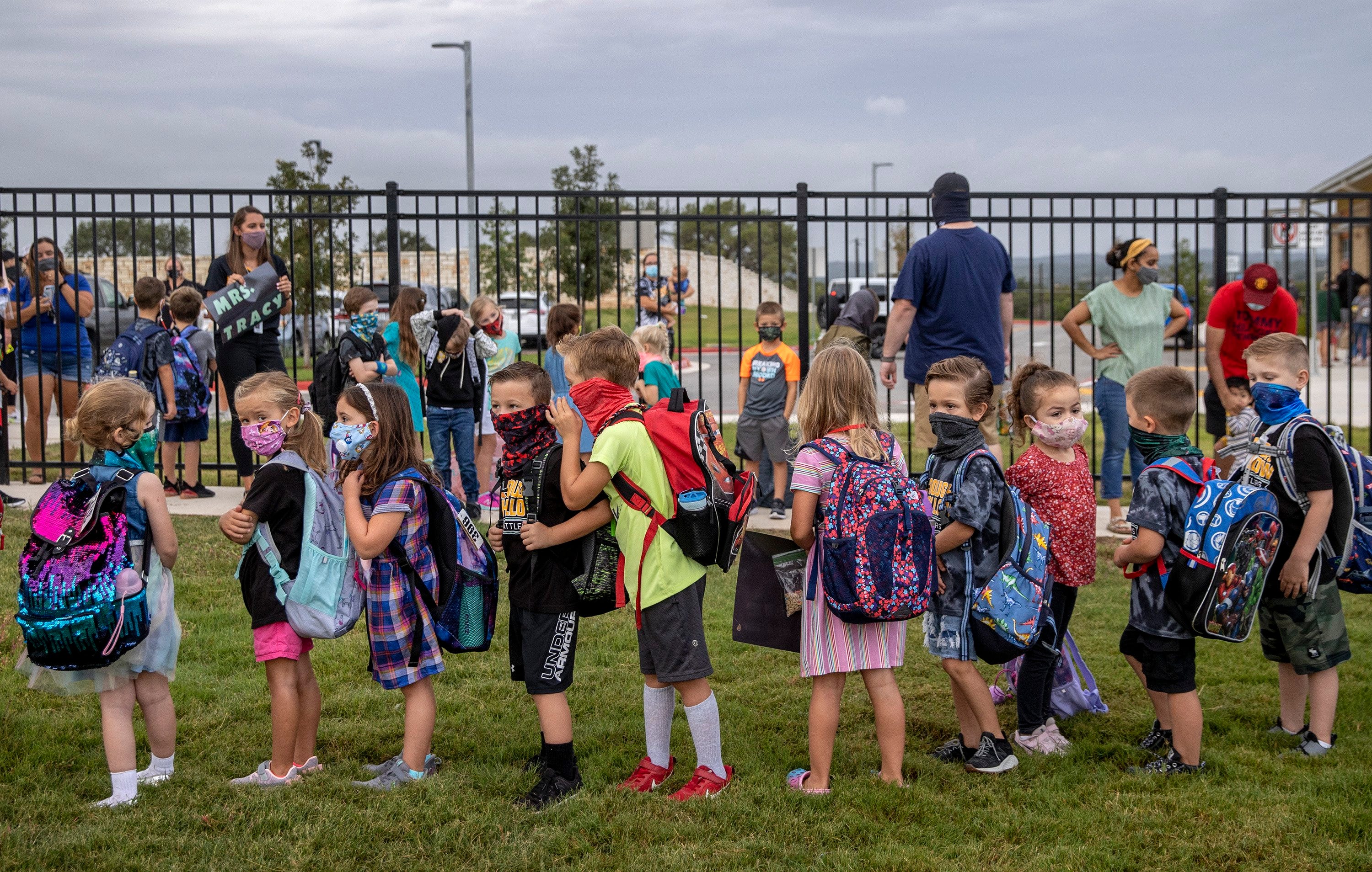 Students line up on the first day of school at Rough Hollow Elementary School in Spicewood on Tuesday September 8, 2020.