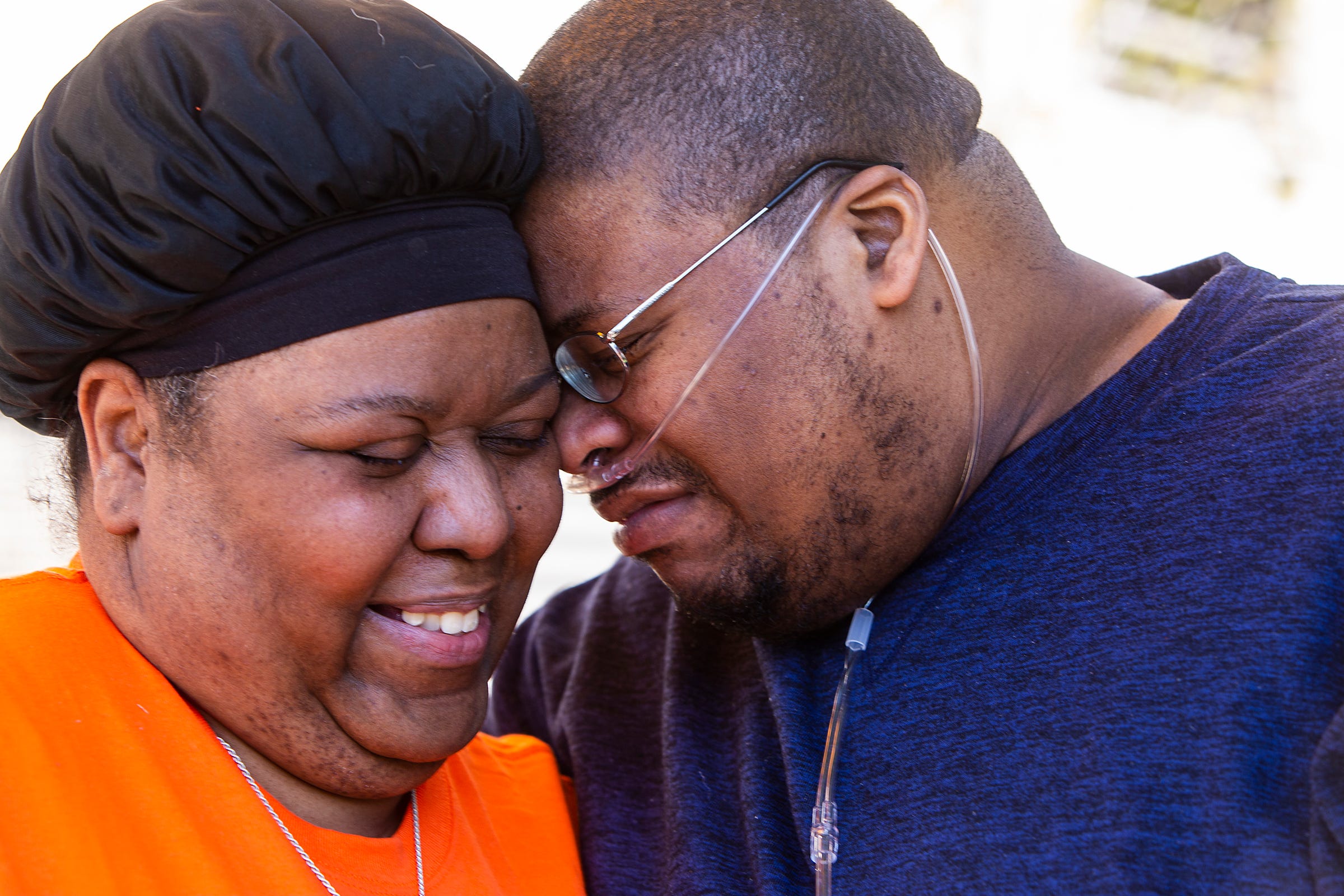 Charlunda Thompson, 45, of Inkster tearfully reunites with her husband David Thompson, 42, on Wednesday, May 6, 2020 at the Mary Free Bed Rehabilitation Hospital in Grand Rapids as she is finally able to depart from a COVID-19 recovery unit. Thompson, a hospice nurse at Henry Ford Hospital, was diagnosed with COVID-19 in March and was hospitalized and put on a ventilator for 16 days. She is leaving to be reunited with her husband who she has not seen for 65 days. David Thompson also is still in recovery from a harrowing bought with the Coronavirus that also put him on a ventilator.
