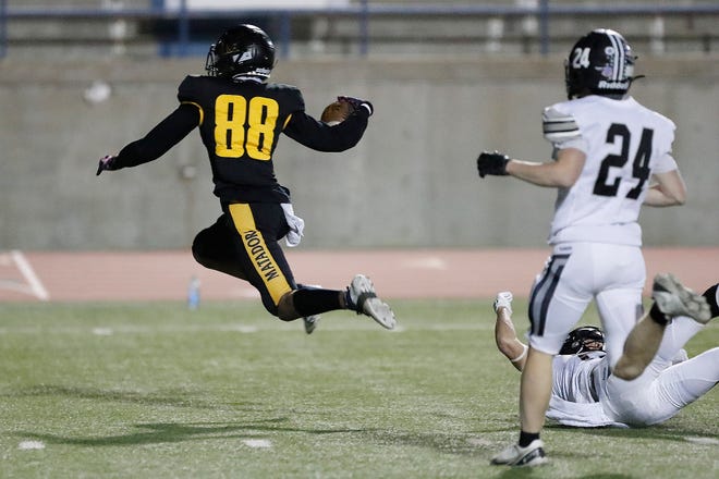 El Paso Parkland's DJ Crest leaps toward the end zone on a run against Canyon Randall December 17, 2020 in the Class 5A District 2 playoff round at Ratliff Stadium in Odessa.